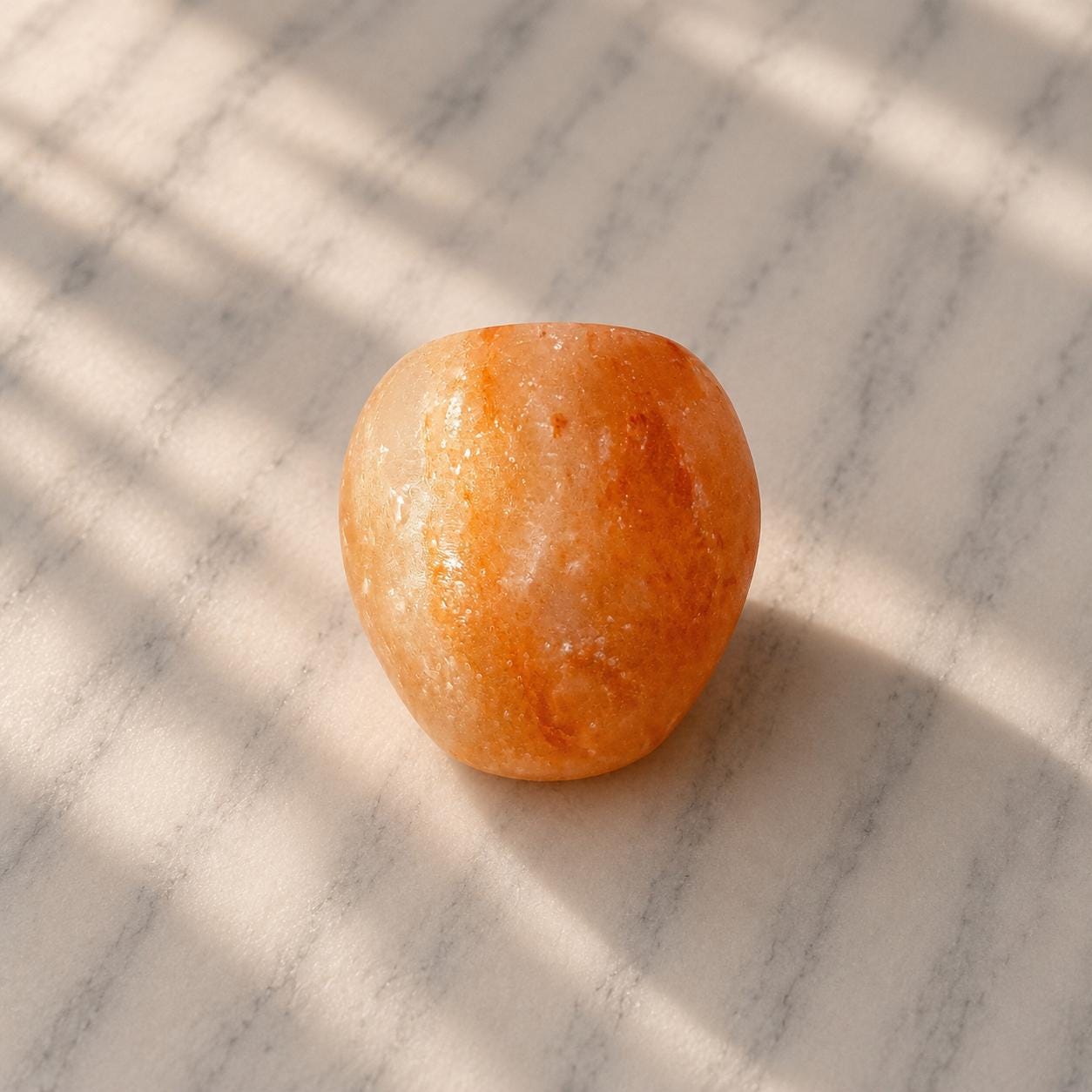Himalayan Salt Candle Holder Apple shape glowing with warm candlelight