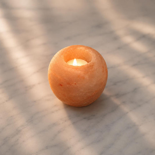 Himalayan Salt Candle Holder Apple shape glowing with warm candlelight