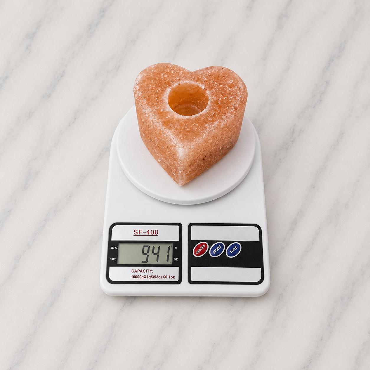 Himalayan Salt Candle Holder Heart shape glowing with warm candlelight