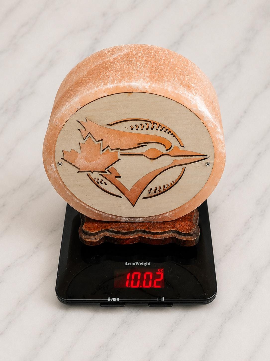 Team Spirit 3D Himalayan Salt Lamp glowing with warm pink light
