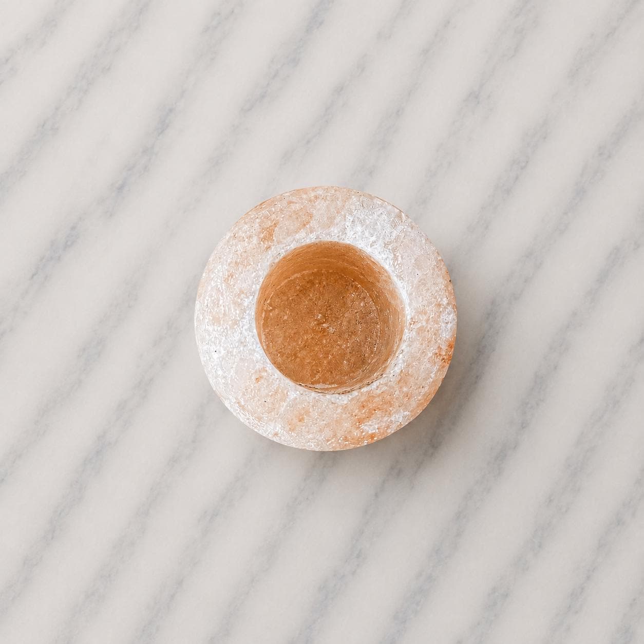 Himalayan Salt Candle Holder Cylinder glowing with warm candlelight