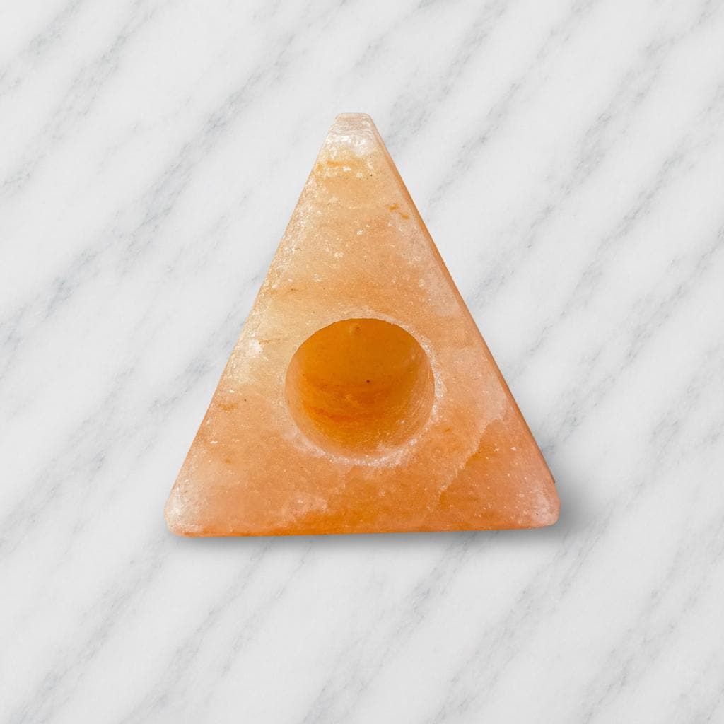 Himalayan Salt Candle Holder Triangle shape glowing with warm candlelight