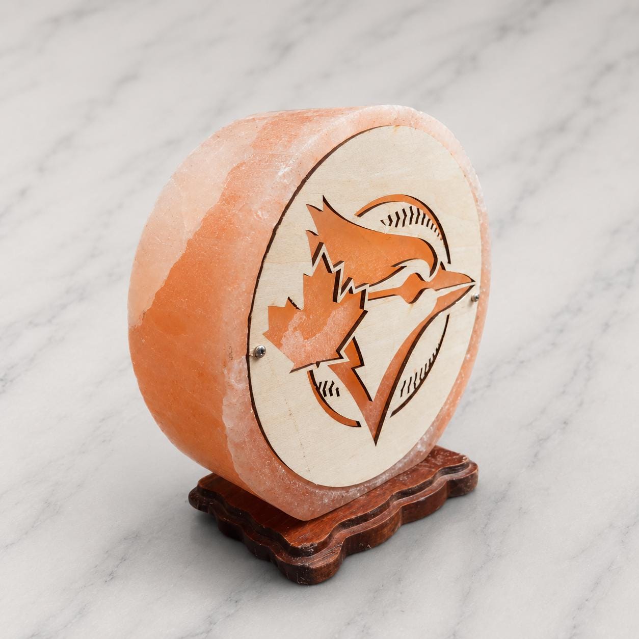 Team Spirit 3D Himalayan Salt Lamp glowing with warm pink light