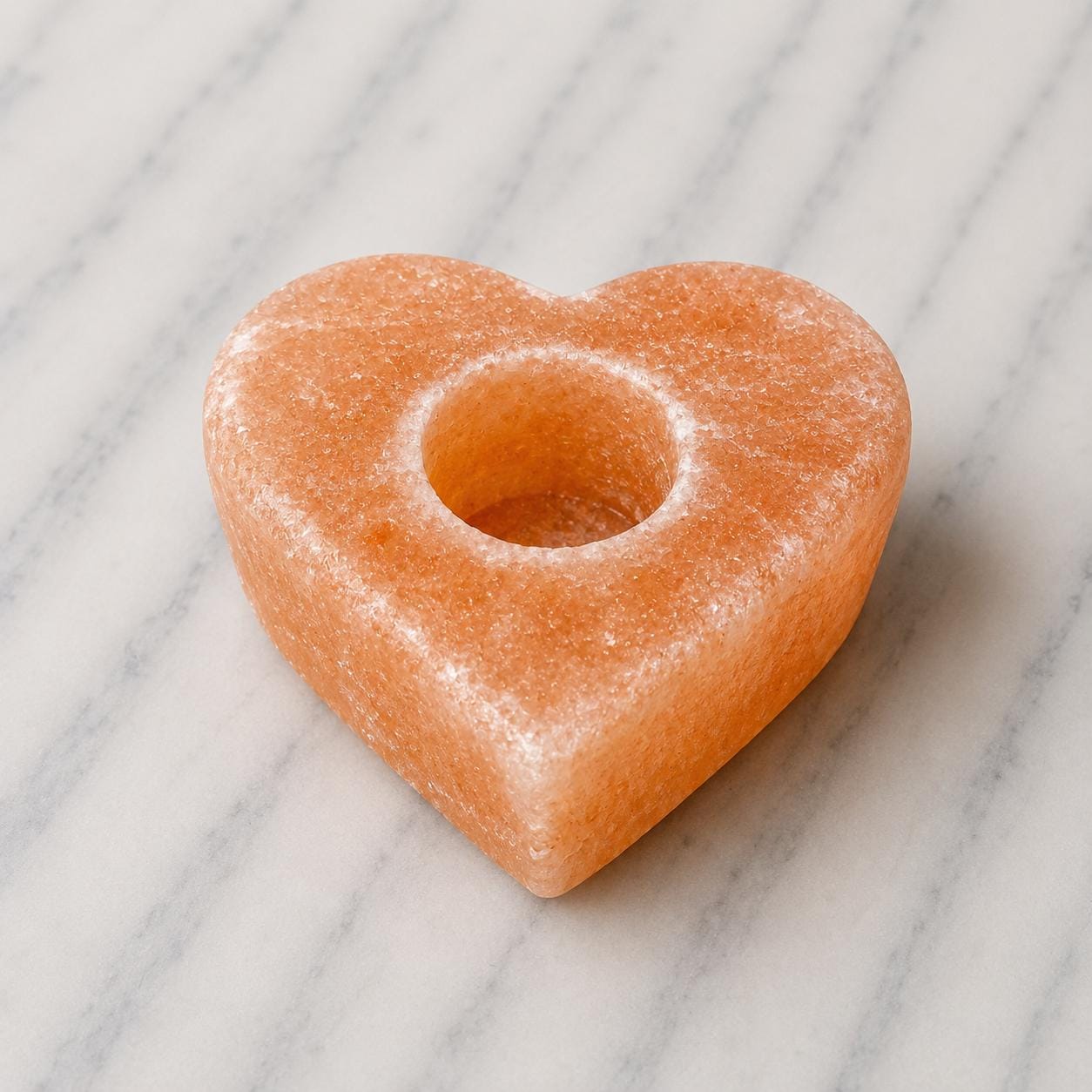 Himalayan Salt Candle Holder Heart shape glowing with warm candlelight