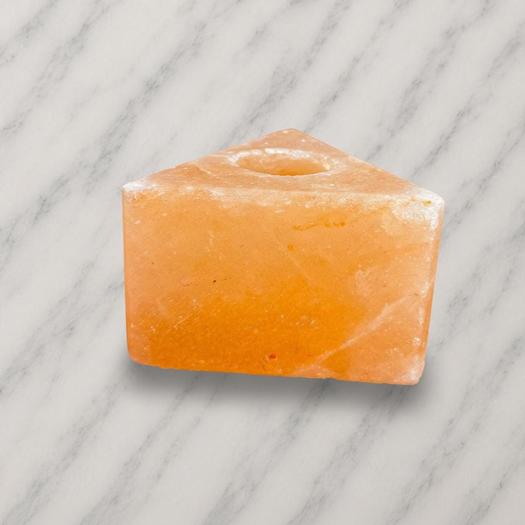 Himalayan Salt Candle Holder Triangle shape glowing with warm candlelight