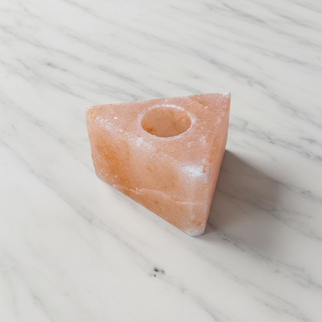 Himalayan Salt Candle Holder Triangle shape glowing with warm candlelight