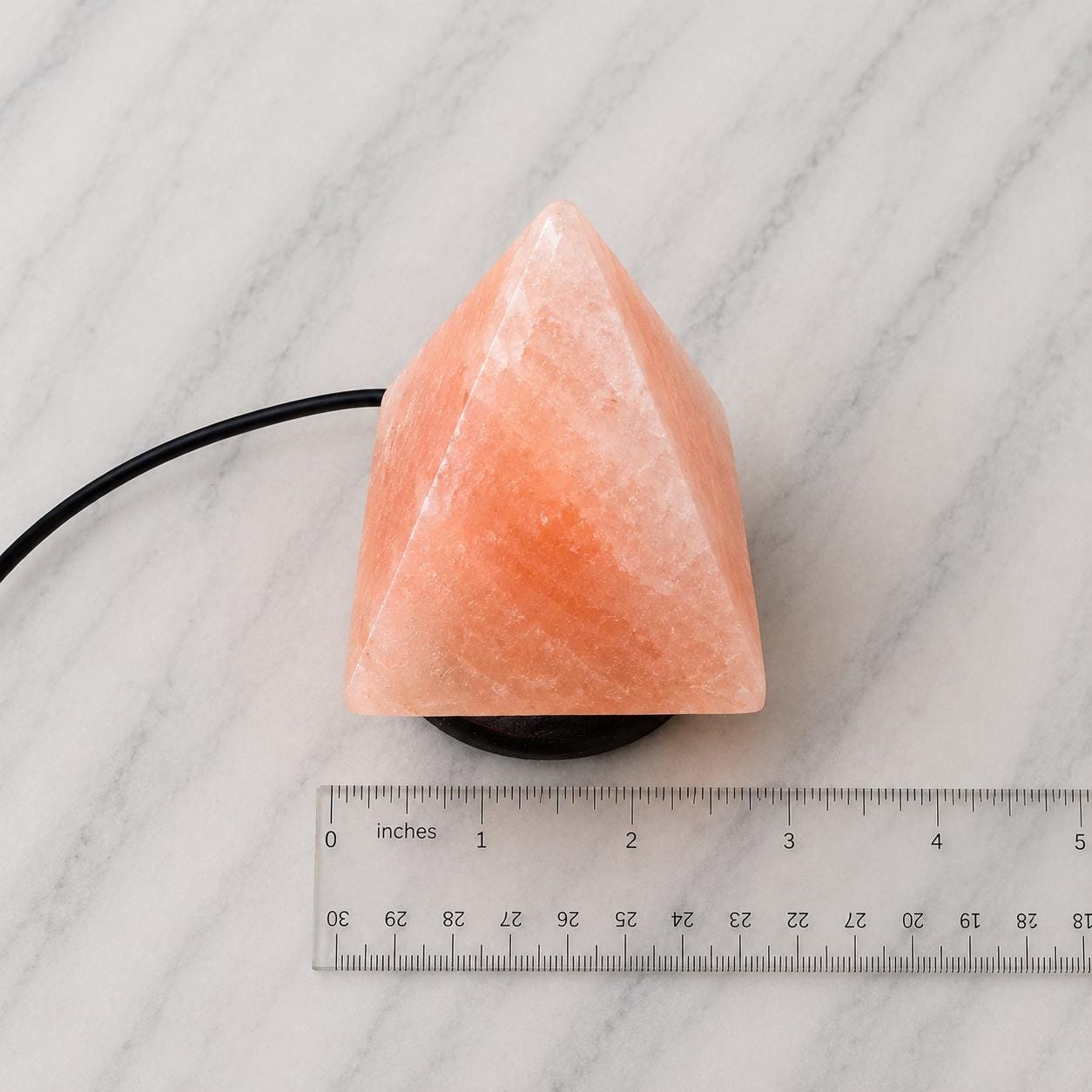 Mini Pyramid Himalayan Salt Lamp USB glowing pink on a desk