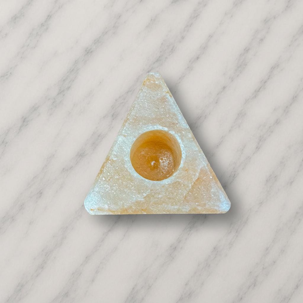 Himalayan Salt Candle Holder Triangle shape glowing with warm candlelight