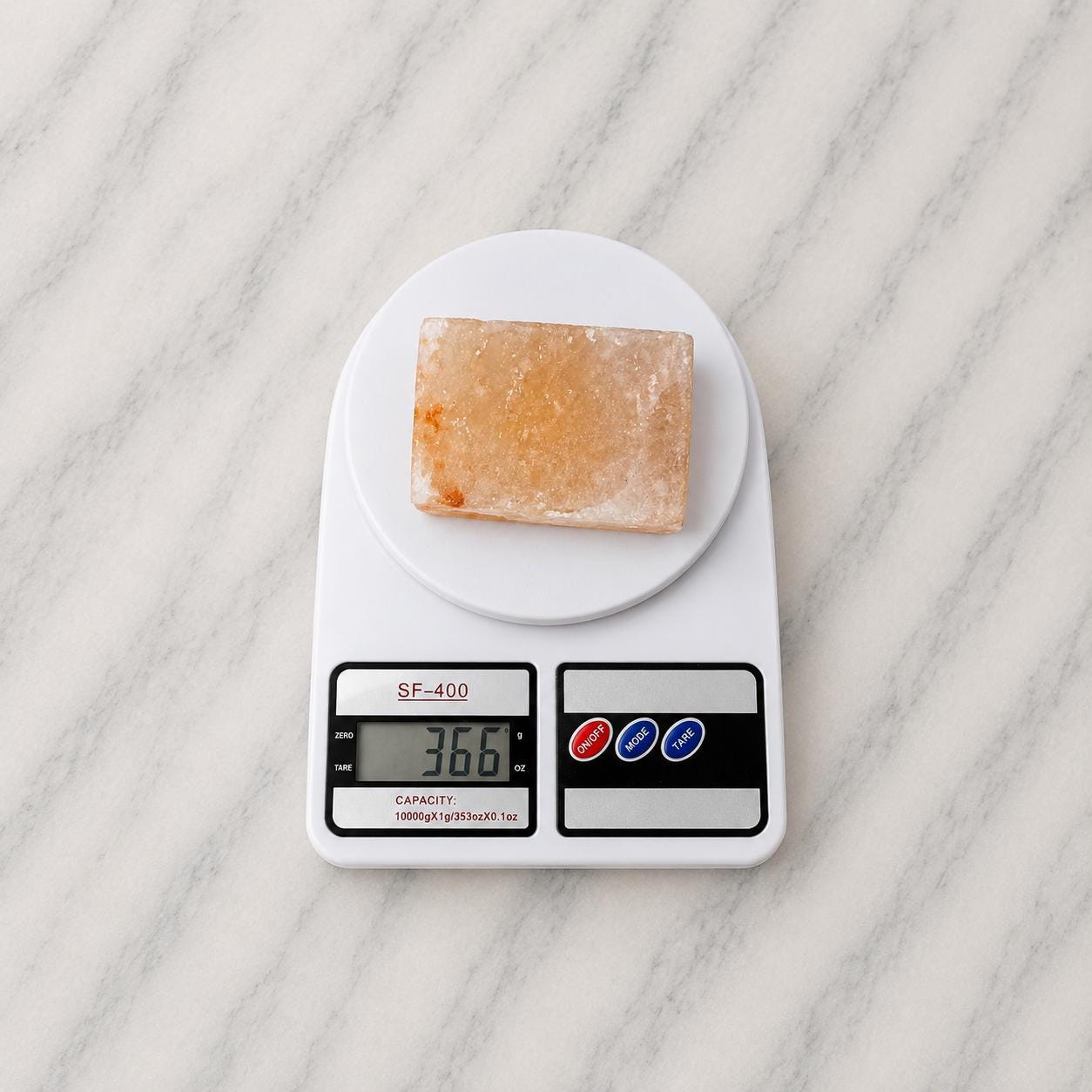 Himalayan Salt Massage Stone Square pink polished surface close up