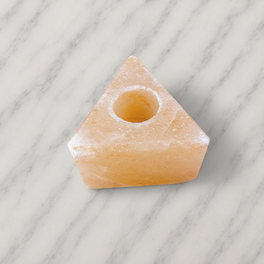 Himalayan Salt Candle Holder Triangle shape glowing with warm candlelight