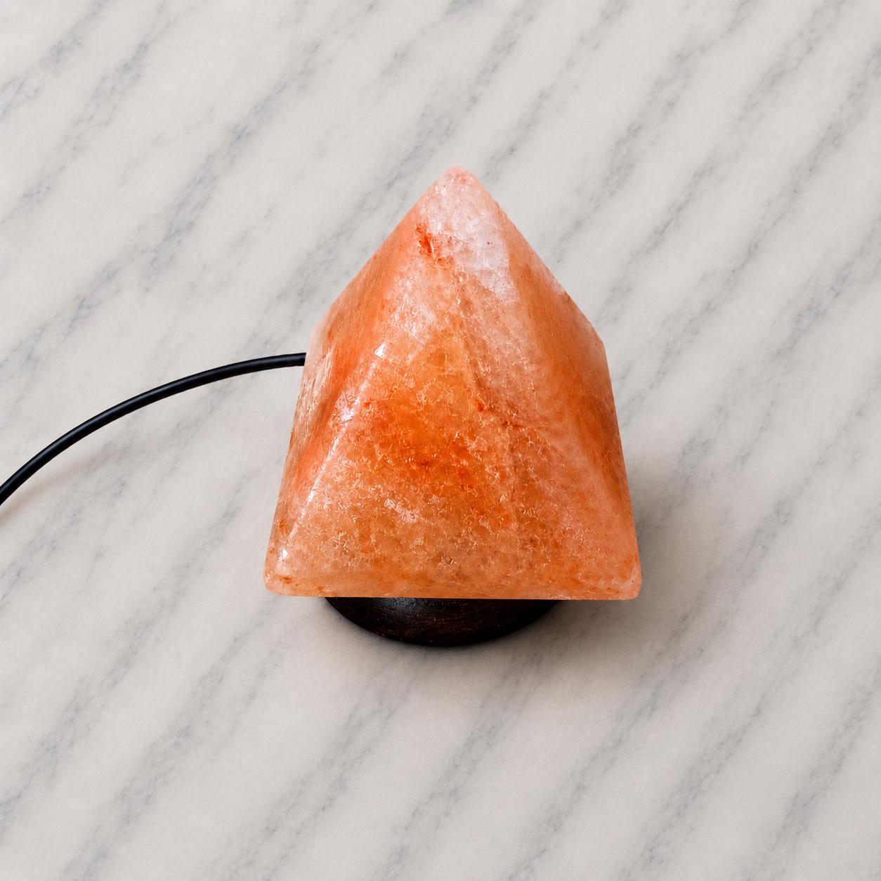 Mini Pyramid Himalayan Salt Lamp USB glowing pink on a desk