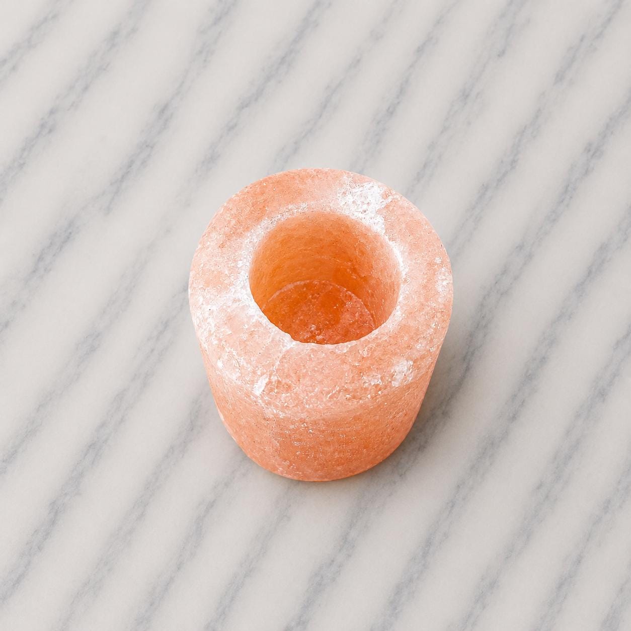 Himalayan Salt Candle Holder Cylinder glowing with warm candlelight