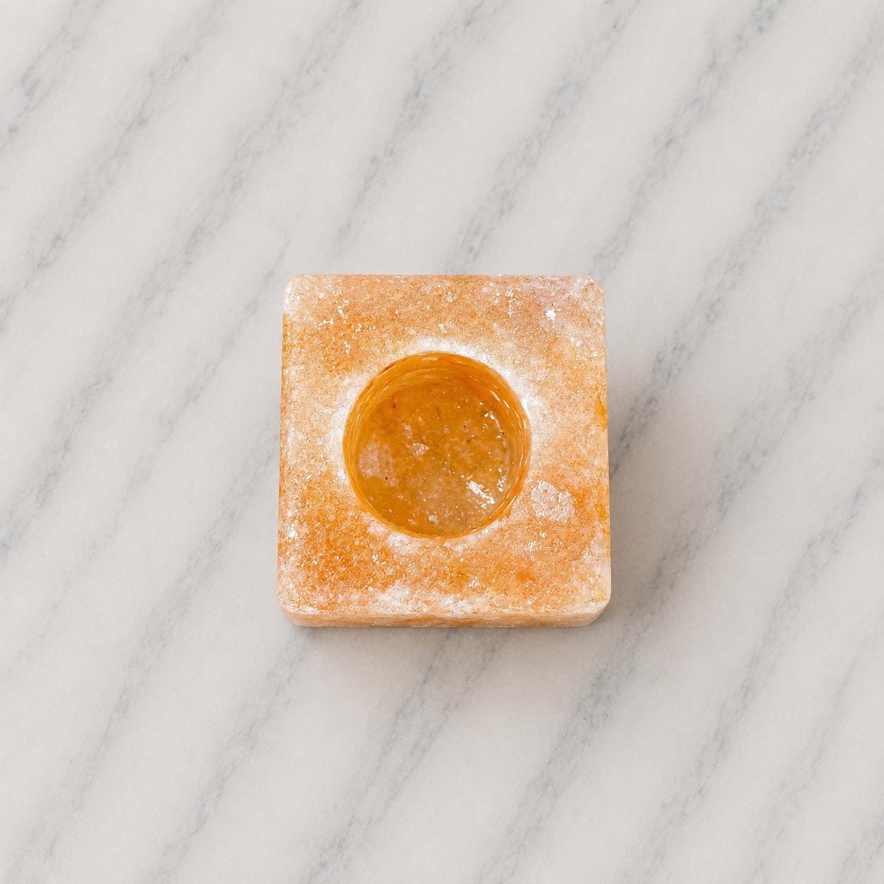 Himalayan Salt Candle Holder Cube minimalist design glowing with warm candlelight