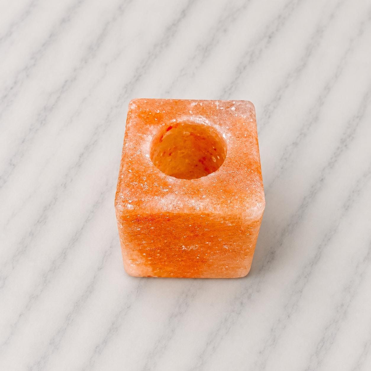 Himalayan Salt Candle Holder Cube minimalist design glowing with warm candlelight