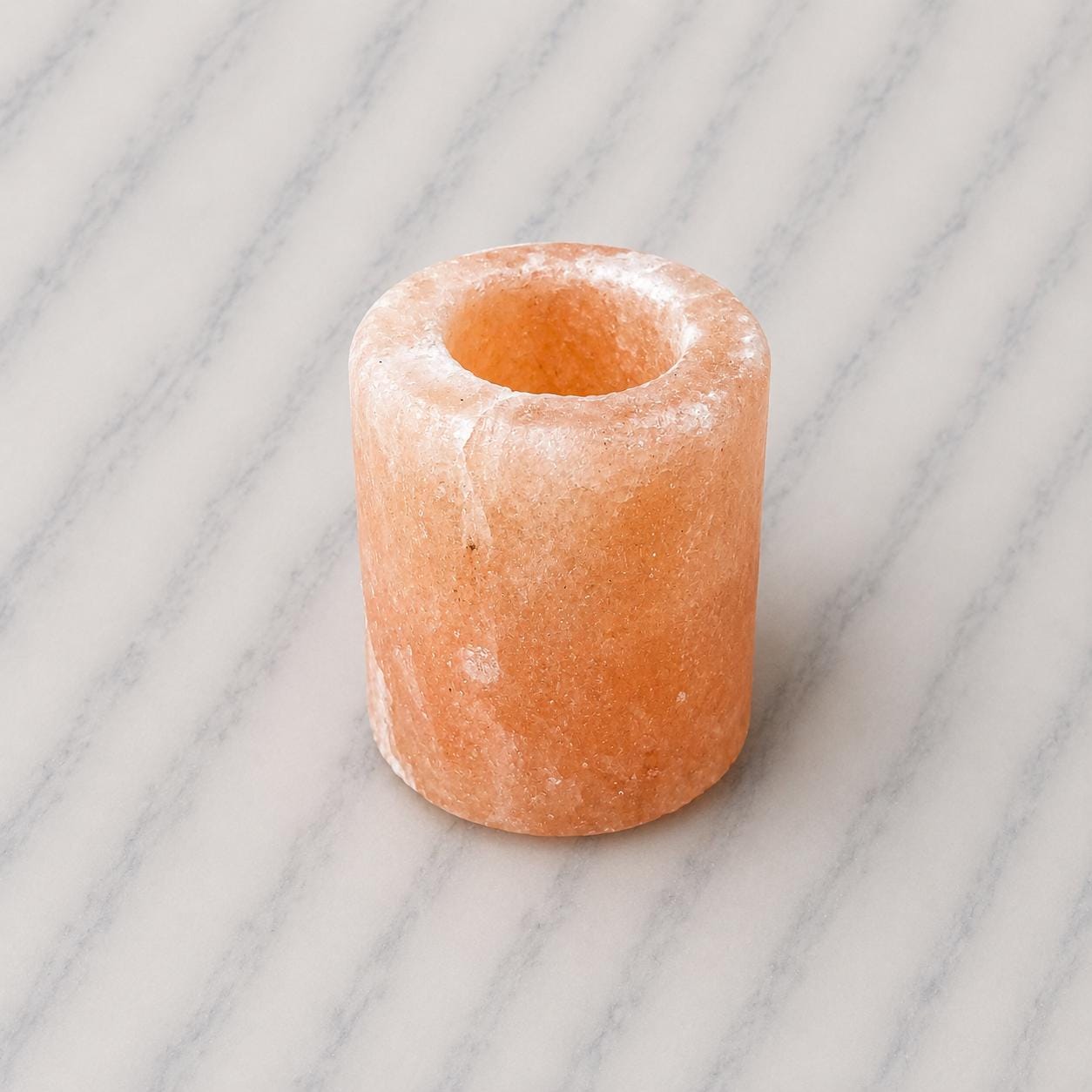 Himalayan Salt Candle Holder Cylinder glowing with warm candlelight