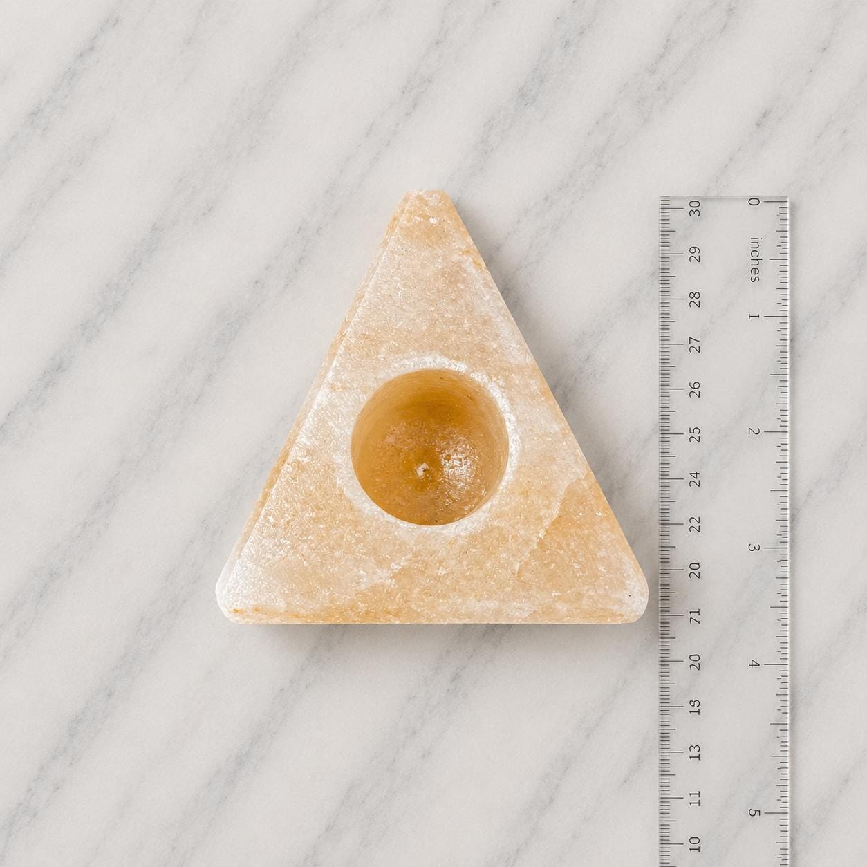 Himalayan Salt Candle Holder Triangle shape glowing with warm candlelight
