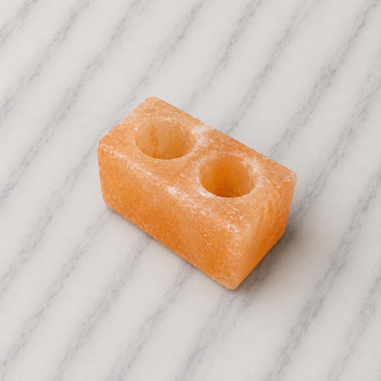 Himalayan Salt Candle Holder Double Cube with two candle wells glowing