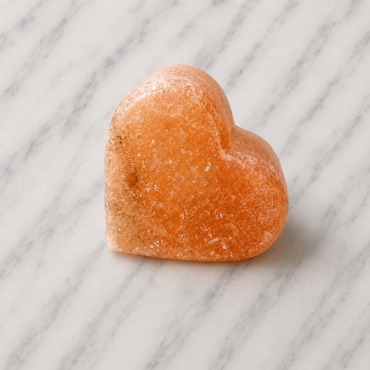 Himalayan Salt Candle Holder Heart shape glowing with warm candlelight