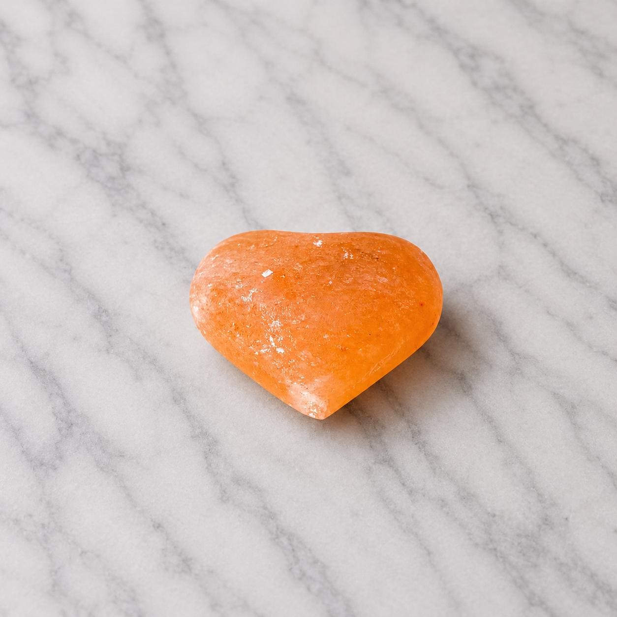 Himalayan Salt Massage Stone Heart shaped pink polished surface
