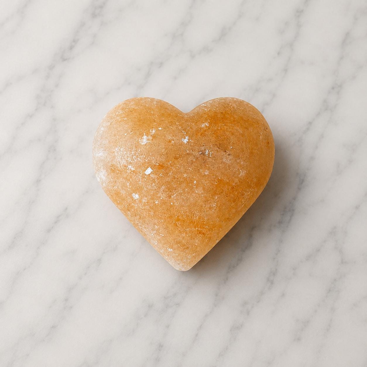 Himalayan Salt Massage Stone Heart shaped pink polished surface