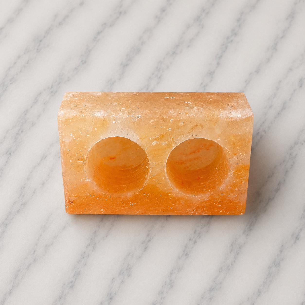 Himalayan Salt Candle Holder Double Cube with two candle wells glowing