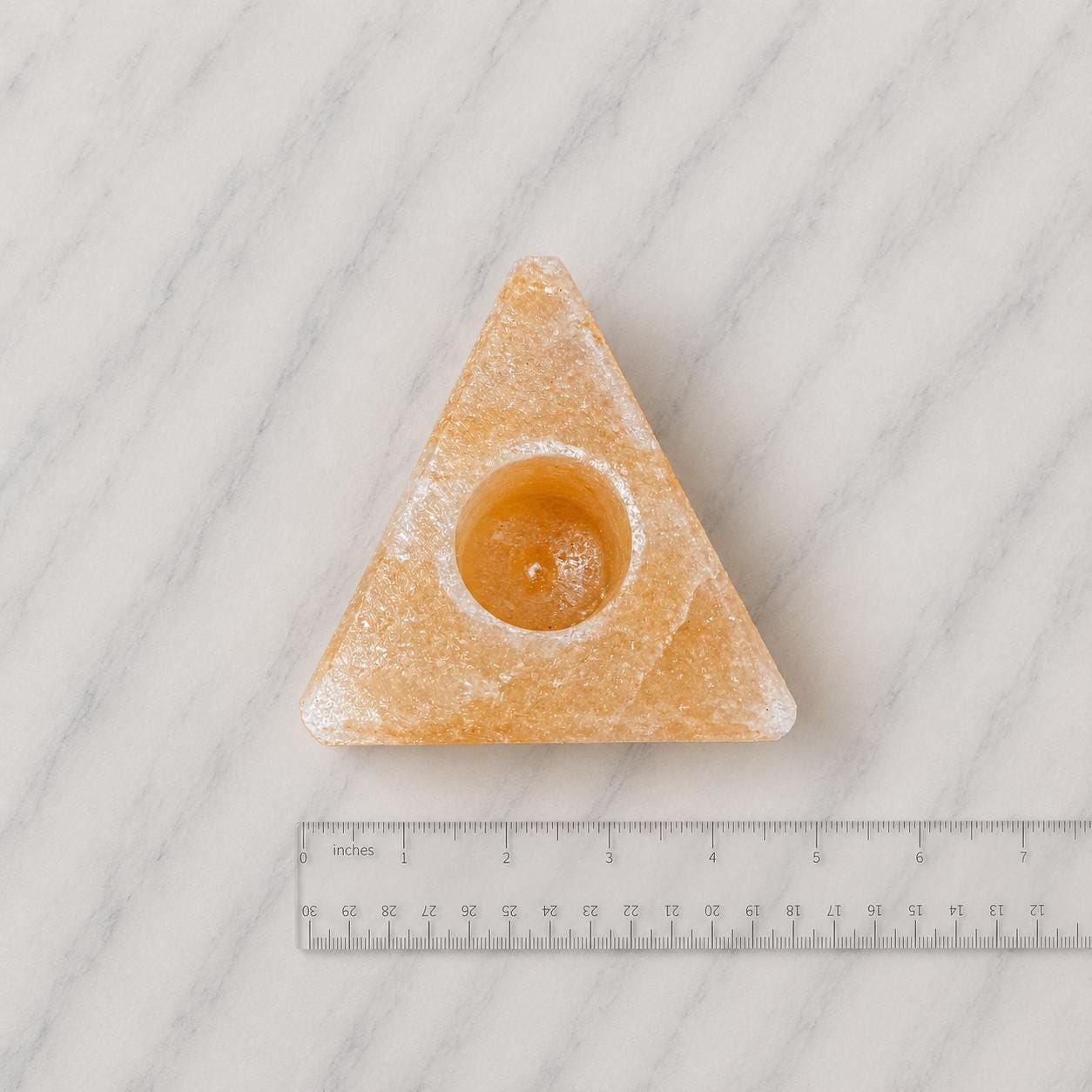 Himalayan Salt Candle Holder Triangle shape glowing with warm candlelight