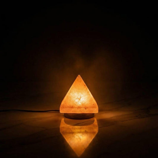 Mini Pyramid Himalayan Salt Lamp USB glowing pink on a desk