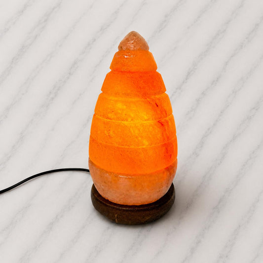 Teardrop Himalayan Salt Lamp elegant flowing shape glowing pink