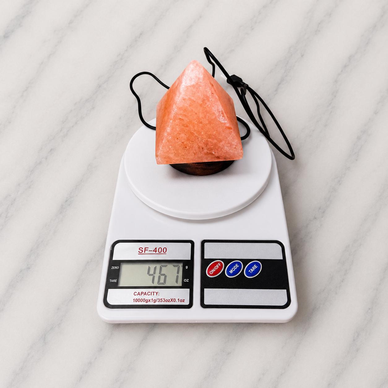 Mini Pyramid Himalayan Salt Lamp USB glowing pink on a desk