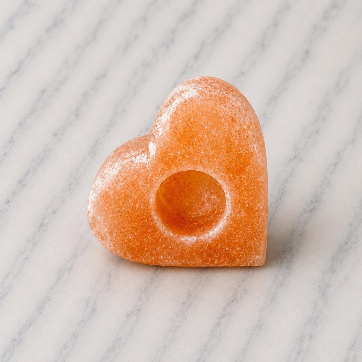Himalayan Salt Candle Holder Heart shape glowing with warm candlelight