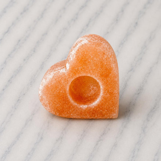 Himalayan Salt Candle Holder Heart shape glowing with warm candlelight