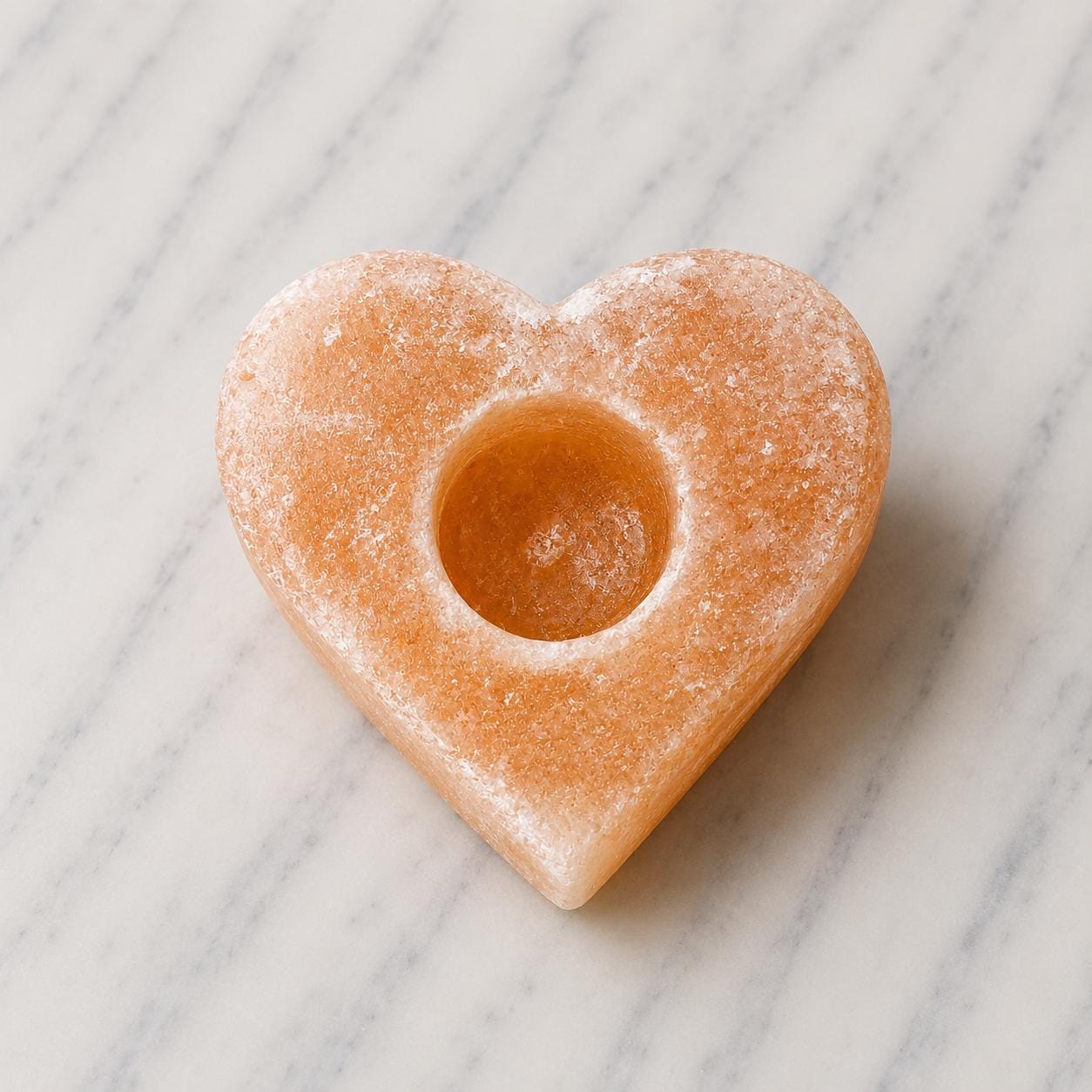 Himalayan Salt Candle Holder Heart shape glowing with warm candlelight